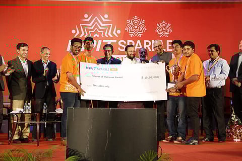 Prakash Javadekar, Union Minister for HRD, felicitating the Platinum Award winning team