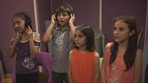 Yazidi children during the recording of the music video