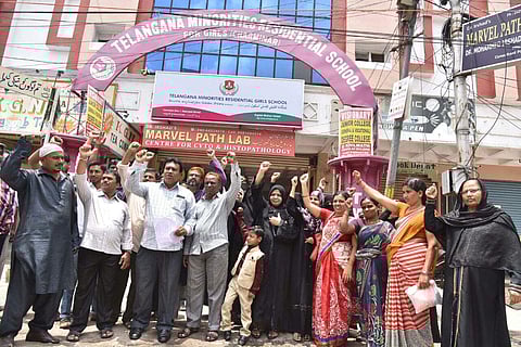 Parents protesting at the gate of TMREIS, Charminar