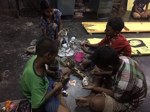 State and District prize winner, celebrated artist Mala Paul from Kumartuli is helping these youngsters in constructing their own Divinity
