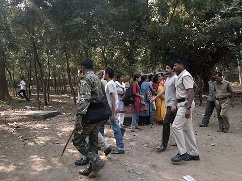 Mustafa Kamal and Arkadeep Goswami being escorted to court on November 23 by the police officers as their family and friends look on (Pic: Shubhodeep Ghosh)
