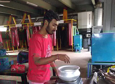 Rishav, a student, has worked on a process to combine plastic waste and fly ash to develop the construction material like paver block and bricks | (Pic: CUTM)