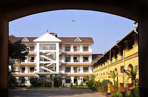 The yellow building divided into two wings- is what remains of the original heritage structure | St Josephs Anglo Indian HSS