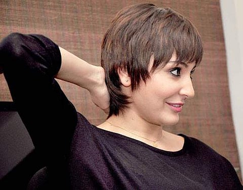 A country where a woman's features, especially her hair are of prime importance. And if you cut it...? Awkward silence*