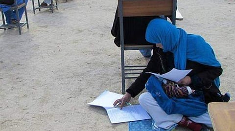 The Afghan farmer wants to complete her education and work toward's women's development in the illiterate, male-dominated country | AFP