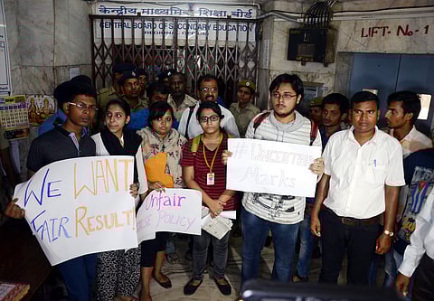 Students are saying it is unfair to ask them to sit for a retest when the leak is not their fault