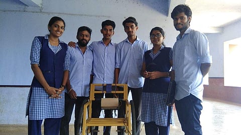 The students of NSS College of Engineering, Palakkad with the voice-controlled wheelchair
