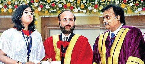 Dr Surinder Singh, Director, National Institute of Biologicals, presenting gold medal to Dr Vinothini Jayaram during a convocation at Sri Ramachandra Medical College and Research Institute