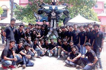 The students of Adi Shankara Institute of Engineering and Technology in front of the robot