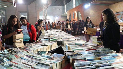 People picking out books at one of the book sales recently
