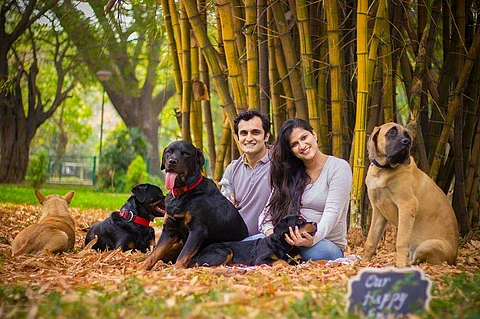 Sanjana Madappa with her husband and her dogs