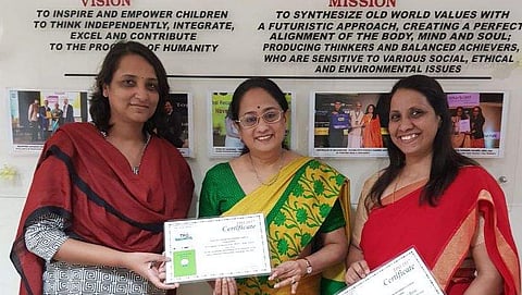 Co-founder Anjali Jain felicitating Meridian School's CEO Usha Reddy