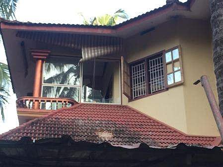 The crude bomb shattered the window panes of the balcony, and roof of the car porch of the house at Pollapoyil near Cheruvathur  (Pic: Express)