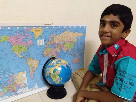 SK Akatheesh is always seen with his maps and a globe when he is at home (Pic: Savithri T)