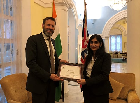British Deputy High Commissioner to India, Oliver Ballhatchet poses with Deepa Jayaraj