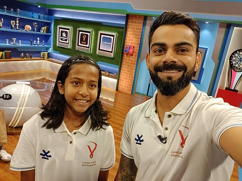 Indian Cricket Captain, Virat Kohli awarded a scholarship to Avani Prashanth and a few others recently (Pic: Sourced)