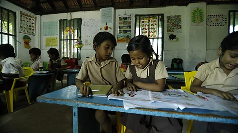 Roshni uses bilingual and graphic instructional methods to help students who speak various mother tongues