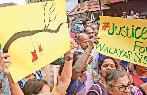 Civilians and various groups protesting the handling of the Walayar case