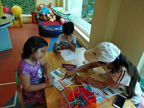 Children engaged in activities at a Cogitus centre (Pic: Cogitus)