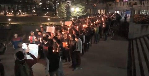 Students in the candle march at IIT Guwahati