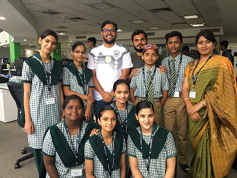 Students at the office | (Pic: HackerRank )