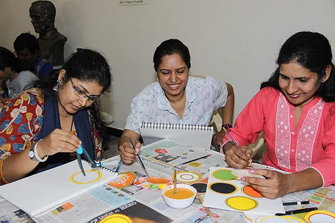 Participants involved in making Ganjifa cards during the workshop (Pic: Karnataka Chitrakala Parishath)