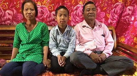 Isaac with his parents