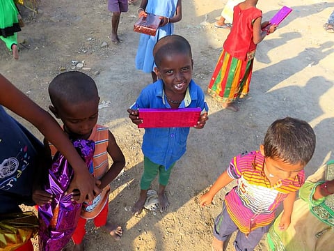 Children receiving gifts from the Agua team during the Gifting Smiles drive held last year (Pic: Agua)