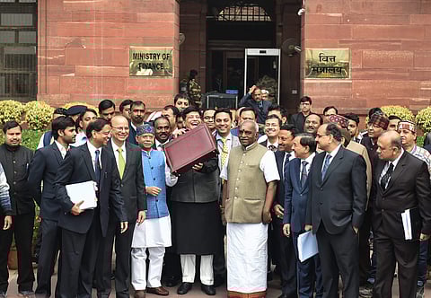 Goyal, flanked by BJP heavyweights went through the motions of showcasing the budget in a briefcase before entering parliament for the mandatory cabinet meeting  (Pic: PTI)