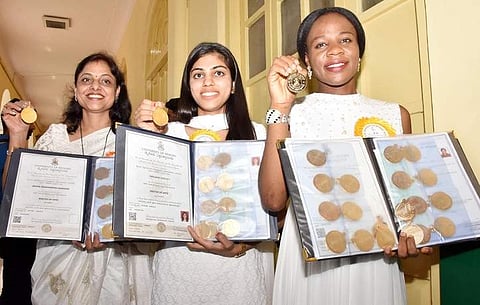 (Right to left) Emelife Stella Chinelo, Sanjana Darla P and Meera Manahar Rao Anasane with their gold medals  (Pic: Express)