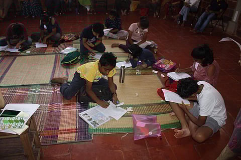 Children completing their assignments during the workshop (Pic: The Teachers Collective)