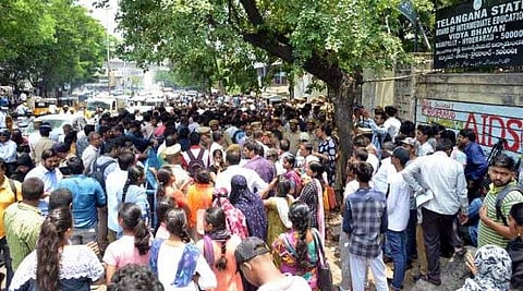 People protesting outside the Telangana Board of Intermediate Education |Courtesy, Telangana Today