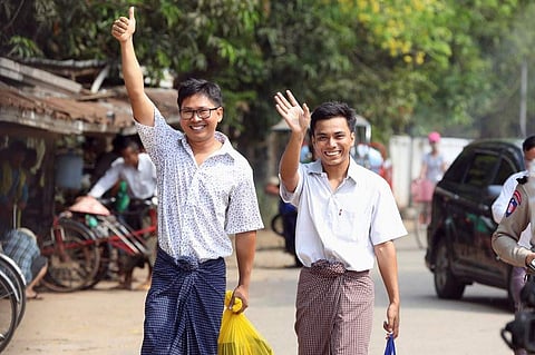 The Reuters reporters Wa Lone, left, and U Kyaw Soe Oo, walking free from prison in Yangon, Myanmar, on Tuesday (Pic: Ann Wang/Reuters)