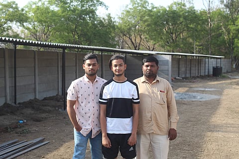 Zabi Khan (centre) is an animal rescuer | (Pic: Sathya Keerthi)