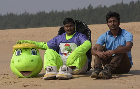The duo ask us to be a responsible tourist if we want to watch the nesting or hatching of turtles | (Pic: Biswanath Swain)