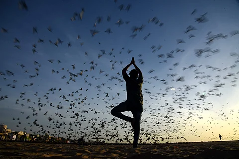 Mahendra reaches the Marina Beach at 5.30 am every day for his daily dose of yoga (Pic: R Satishbabu)