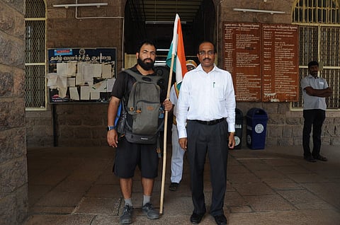 Ashish meeting Dr S Natarajan, District Collector of Madurai while walking in Tamil Nadu