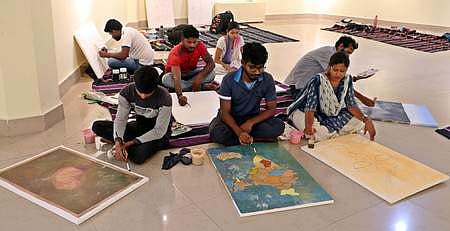 Artists participating in Students' Panting Camp under the programme Swachh Bharat Abhiyan at Lalit Kala Akademi in Bhubaneswar (Pic: Express)