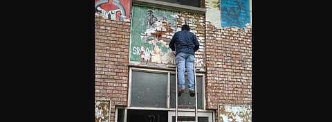 The posters are ripped off to beautify the campus