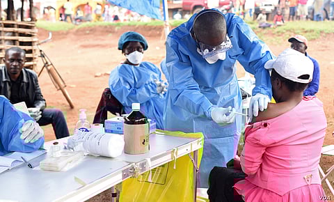 The only people allowed in Mabowa's presence are survivors, who are immune to the virus, and health workers wearing protective gear from head to toe