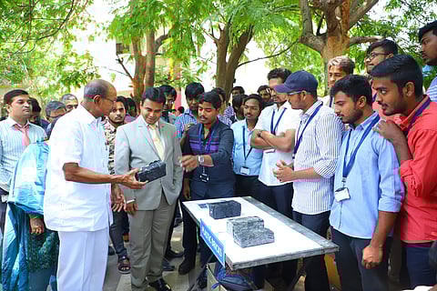Chairman M Laxman Reddy and Principal Dr P Santosh Kumar Patra interact with students who made the plastic blocks and bricks | (Pic: St Martin's Engineering College)