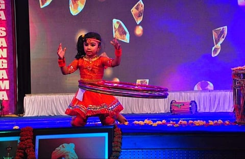 Aadhya wear three rings around her waist and spins them