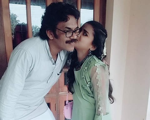 Aysha with her father
