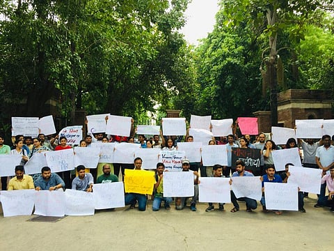The DU researchers at the protest sight