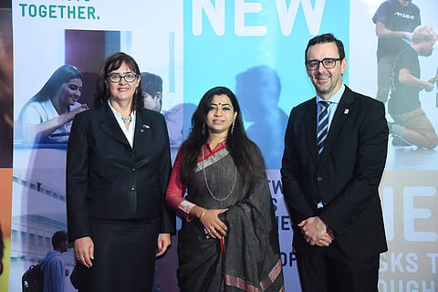 Joanna Kempkers and John Laxon with BJP spokesperson Shweta Shalini