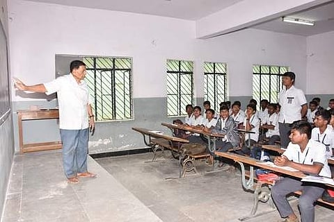 G Seetaram teaching a class of students (Pic: TNIE)