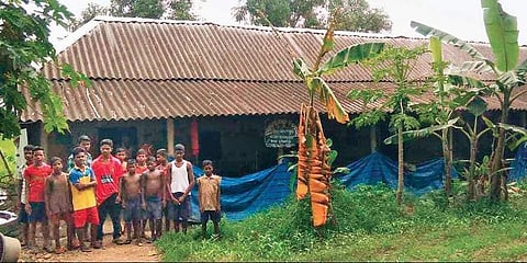 Students in front of the school