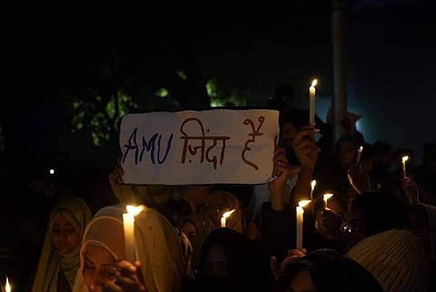 Placard at a protest on campus