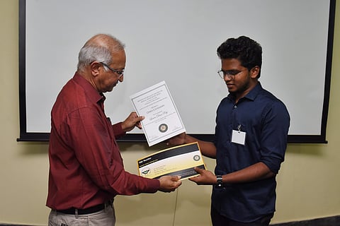 B Lenin Dani Raj receiving the award