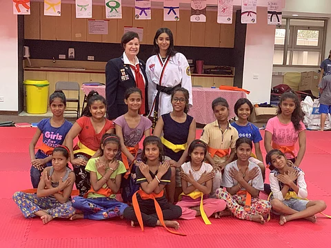 Rayna Singh with her the girls she's teaching taekwondo to (Pics: Amar Singh)